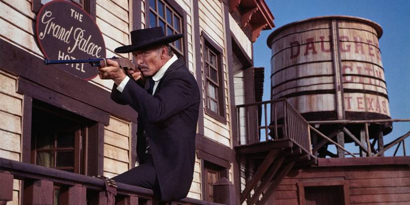 A man aiming a rifle in Sabata