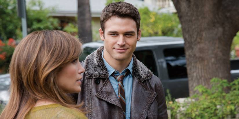 Ryan Guzman as Noah Sandborn staring at Jennifer Lopez as Claire Peterson in The Boy Next Door  