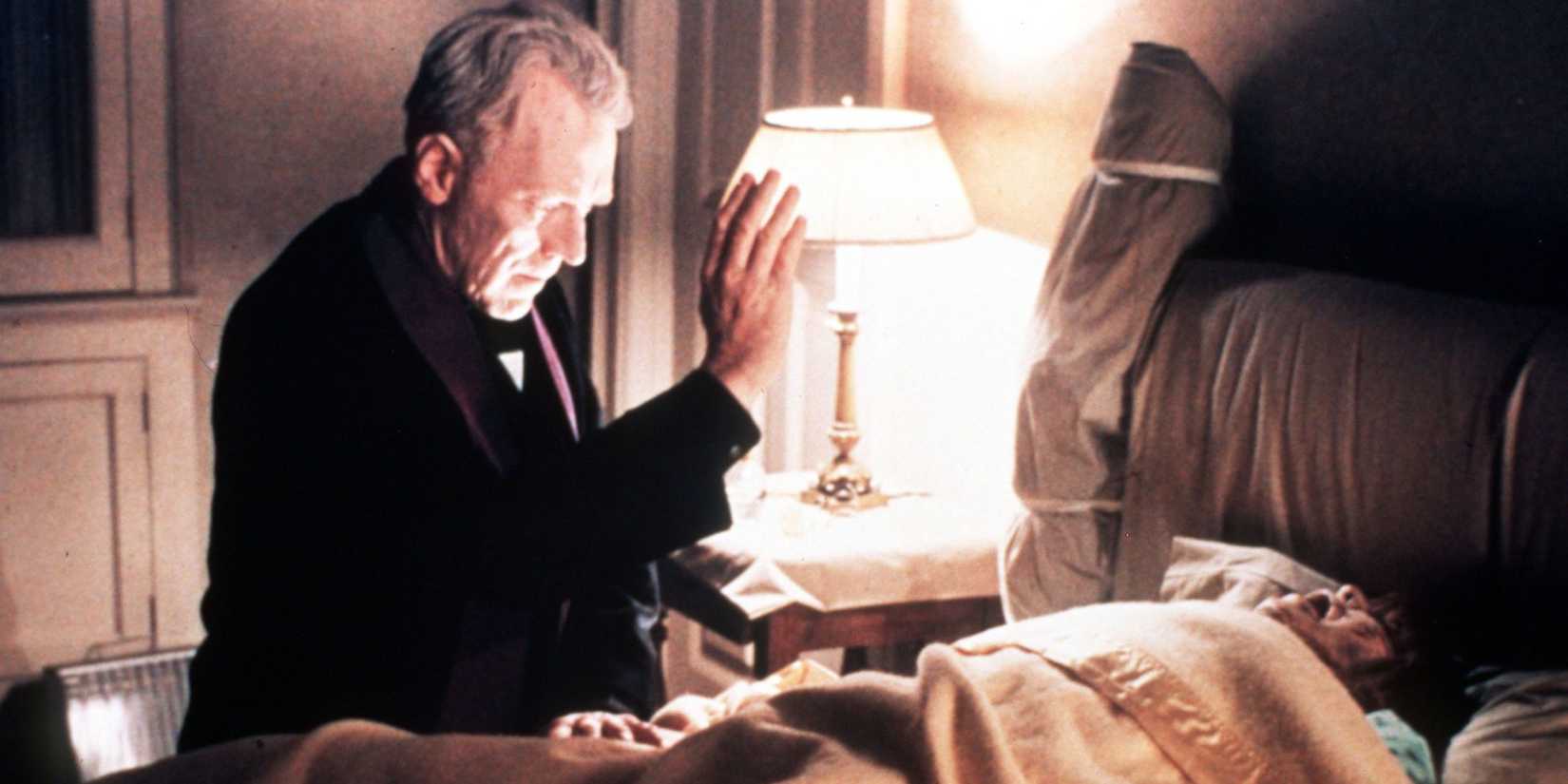 Father Meriin blessing Regan in The Exorcist - 1973