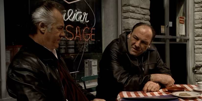 Paulie (Tony Sirico) and Tony (James Gandolfini) sit outside in the finale of The Sopranos.