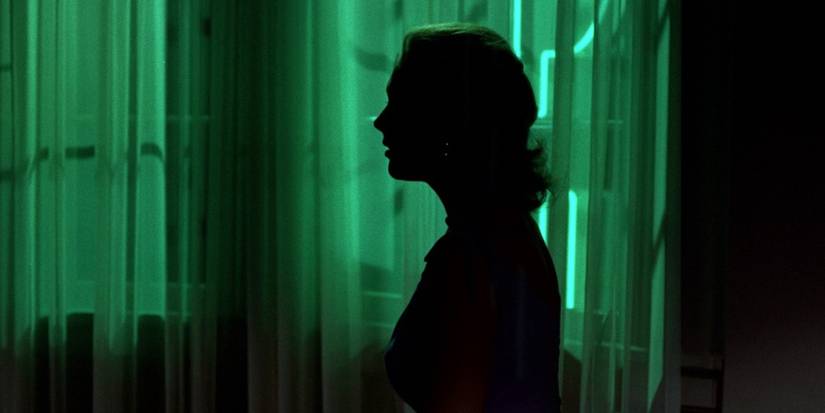 The silhouette of a woman in a dark room in Vertigo