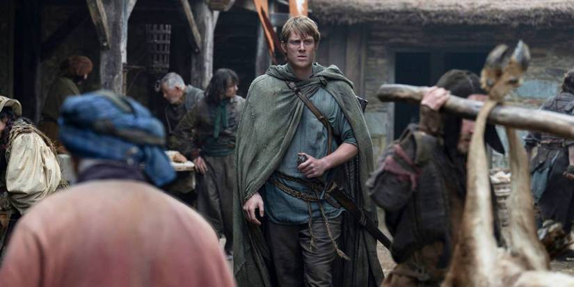 Peter Claffey as Ser Duncan walking through a crowd of people in A Knight of the Seven Kingdoms