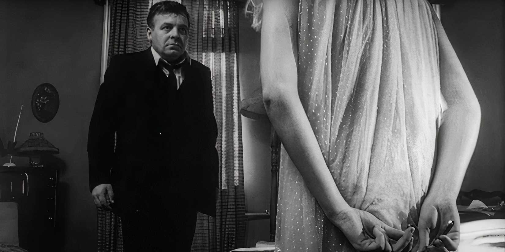 Patrick Wymark as the landlord stares menacingly at Catherine Deneuve as Carol in Repulsion