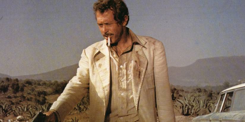 Warren Oates as Bennie with a gun in Bring Me the Head of Alfredo Garcia 