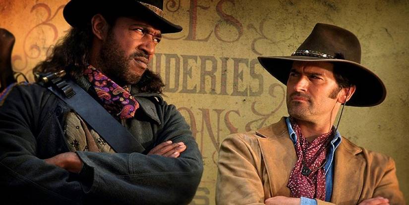 Lord Bowler (Julius Carry) stares back at Brisco County, Jr. (Bruce Campbell) in 'The Adventures of Brisco County, Jr.'