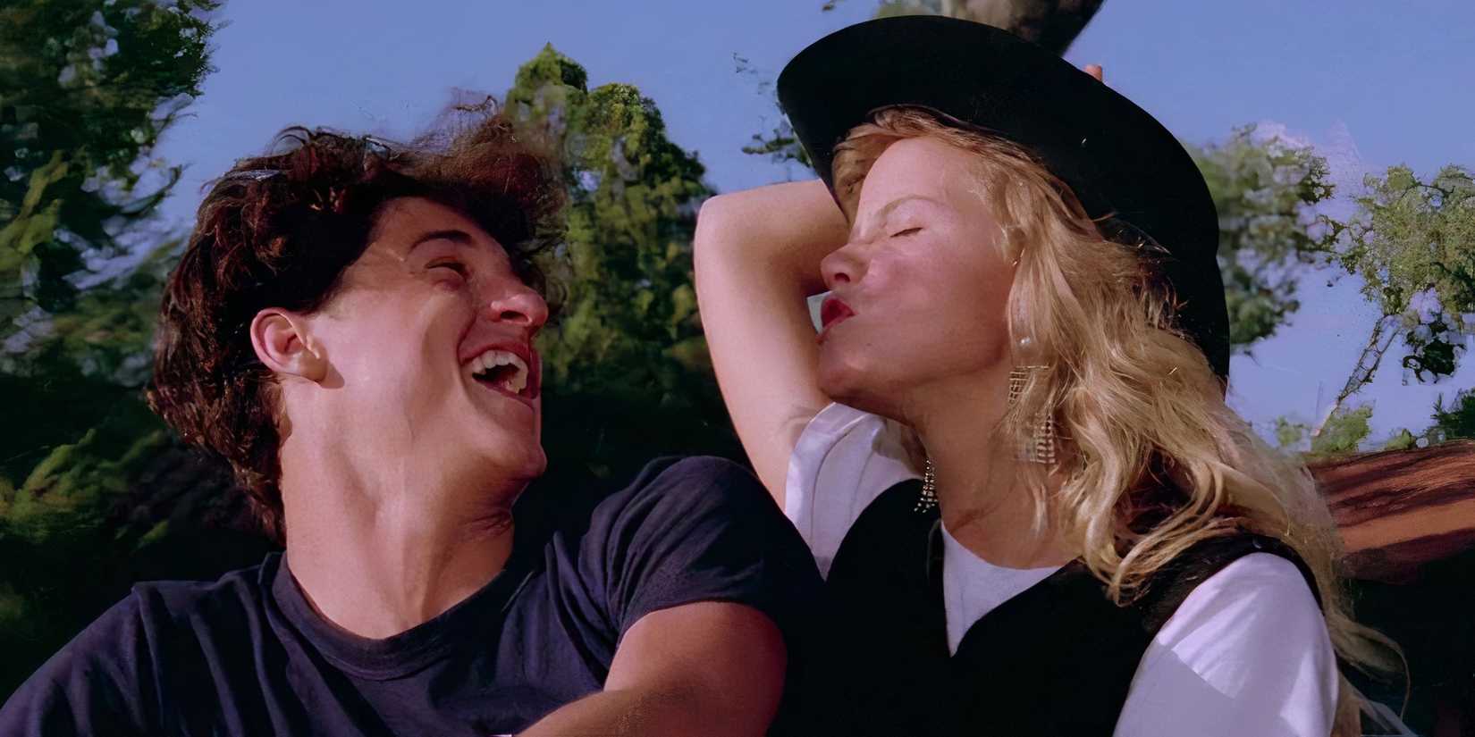 Patrick Dempsey as Ronald laughing at Amanda Peterson as Cindy who is puckering her lips in Can't Buy Me Love