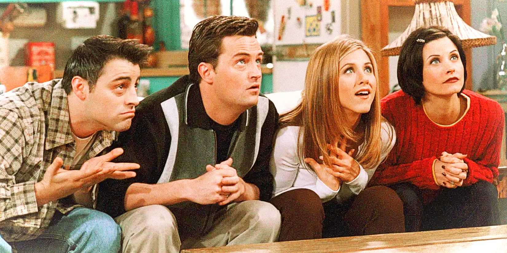 Joey, Chandler, Rachel, and Monica playing trivia in Friends "The One with the Embryos".