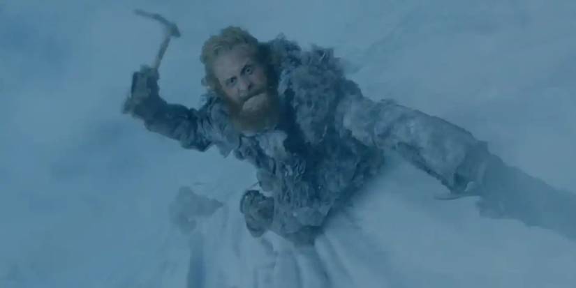 Tormund Giantsbane climbing the wall in Game of Thrones