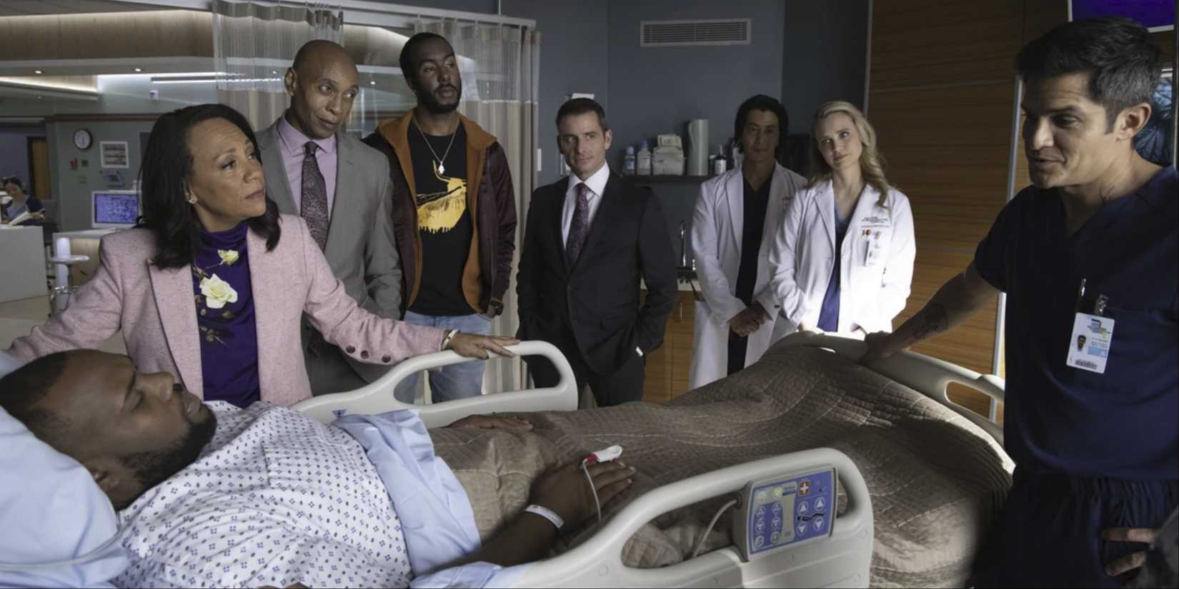 Doctors stand around a man and his family in The Good Doctor.