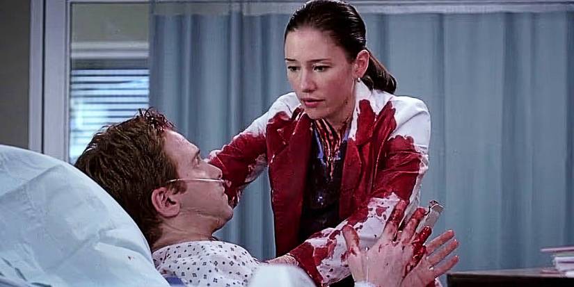 Seth Green as a patient being treated by Lexie Grey in Grey's Anatomy. She is covered in his blood.