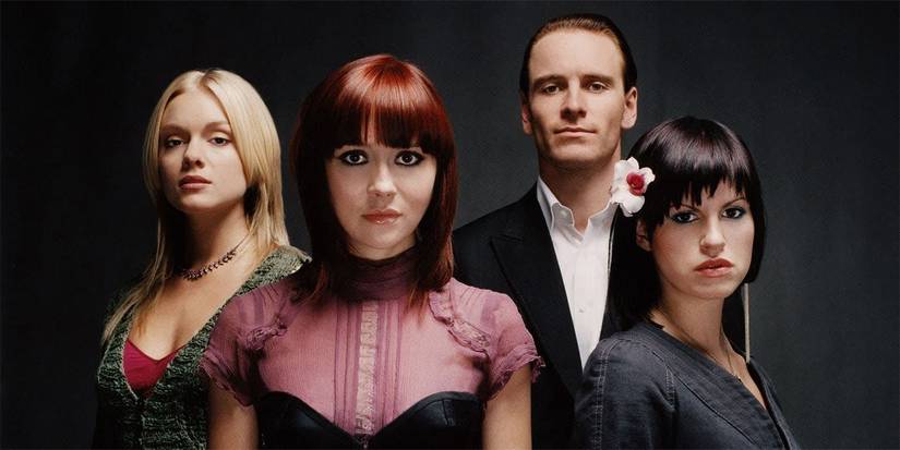 Jemima Rooper, Lara Pyper, Michael Fassbender, and Christina Cole stand together in a promo for Hex.