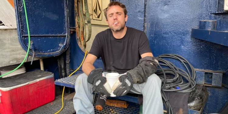 Jake Anderson smoking on ship in Deadliest Catch