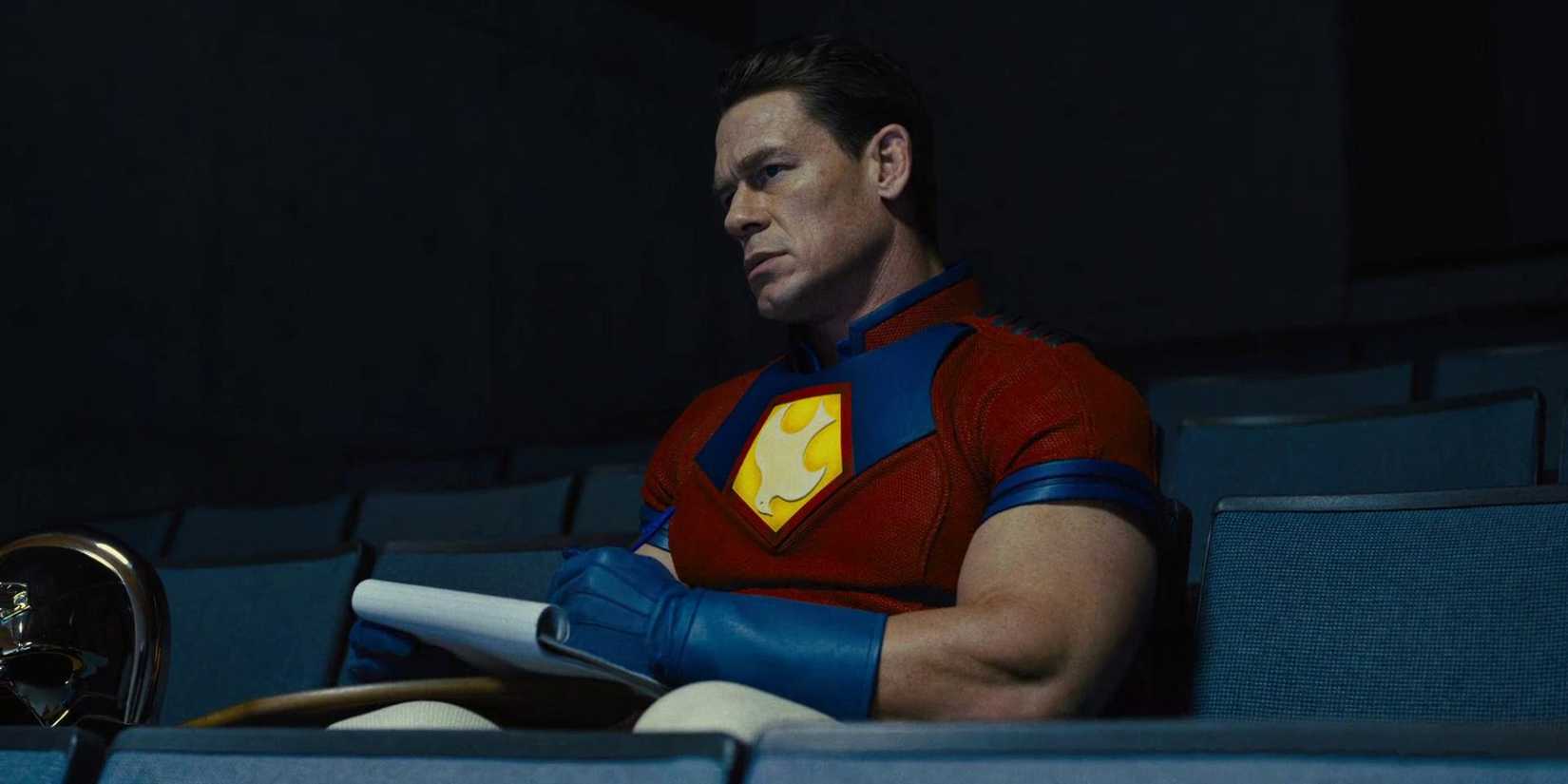 John Cena writing on a notepad in The Suicide Squad (2021)