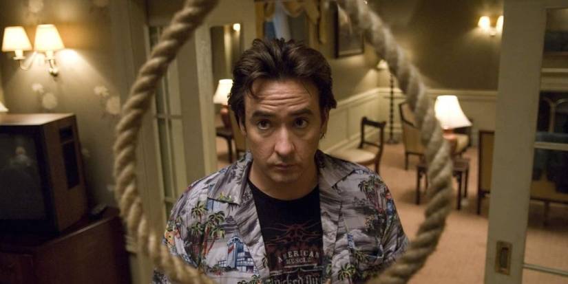 John Cusack staring at a noose in the movie 1408.