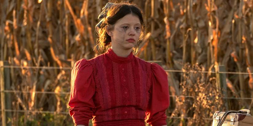 Mia Goth as Pearl crying with makeup running down her cheeks.