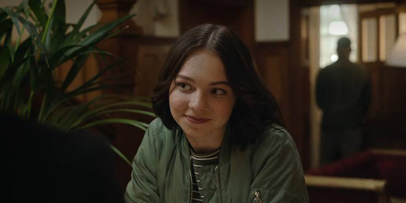 Pip (Emma Myers) investigates outside Little Kilton in 'A Good Girl's Guide to Murder.'