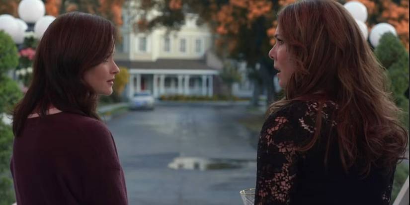 Lorelai looking shocked sitting next to Rory while sitting in the Stars Hollow gazebo after Rory has just announced she's pregnantGilmore Girls: A Year in the Life