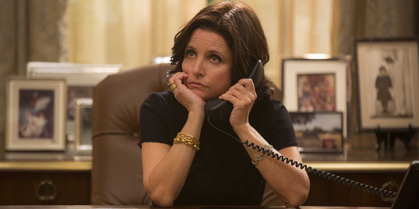 Selina Meyer looking stressed while talking on the phone in Veep.