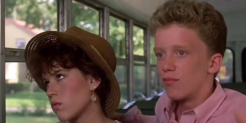 Farmer Ted next to an annoyed Sam in Sixteen Candles.