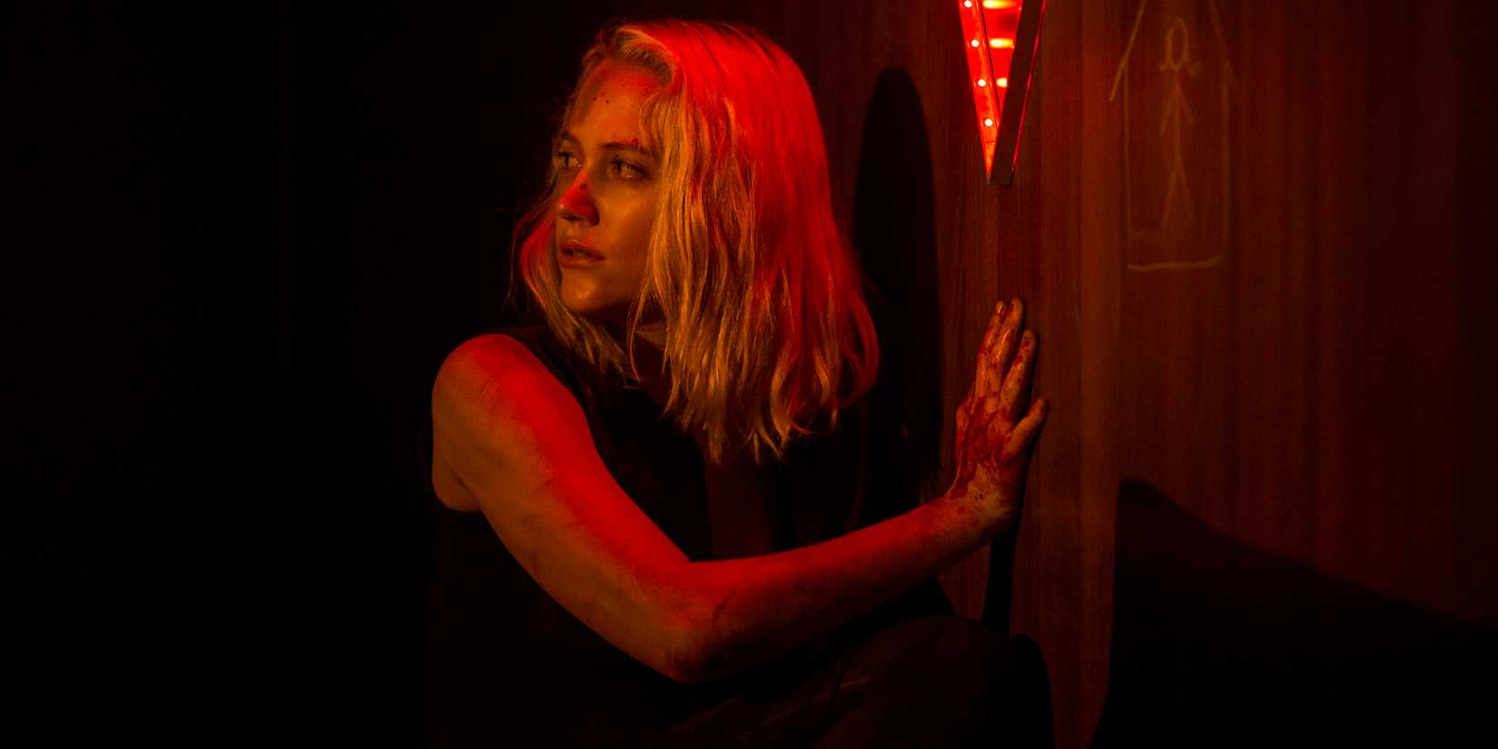 Maika Monroe as Julia in Tau