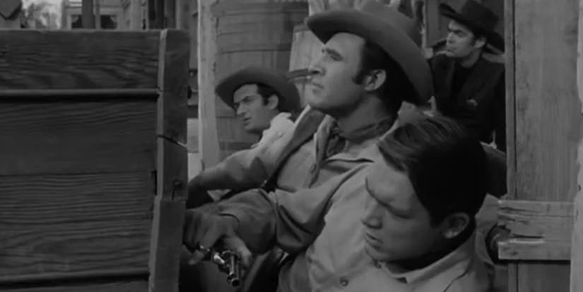 Marshal Frank Ragan (Larry Ward), Deputy Del Stark (Chad Everett), Deputy J.D. Smith (Jack Elam), and Deputy Vance Porter (Michael Greene) in a gunfight in 'The Dakotas' episode "Sanctuary at Crystal Springs."