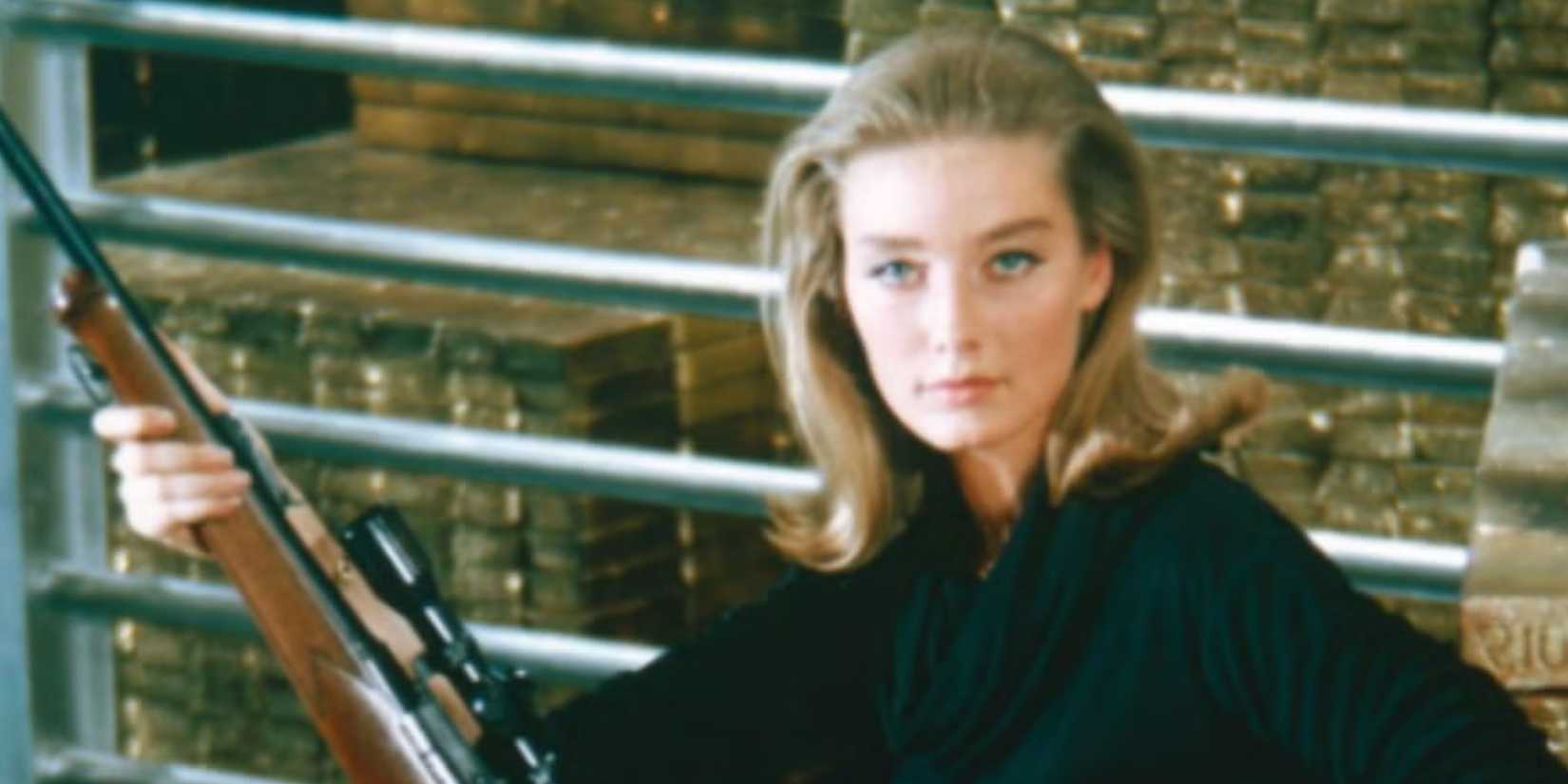 Tilly Masterson (Tania Mallet) holding a gun in 'Goldfinger'