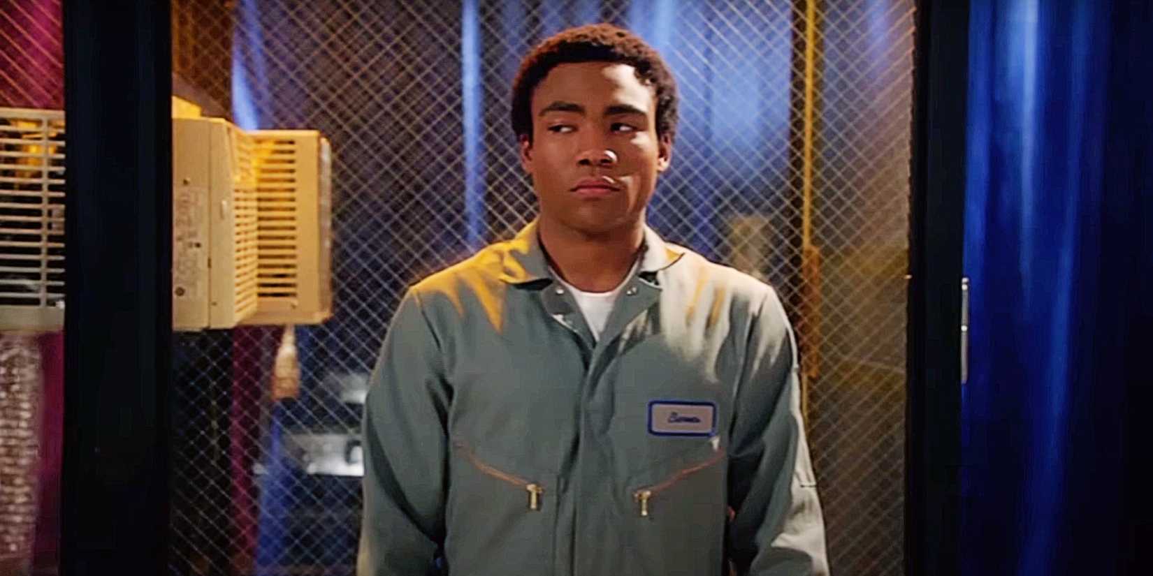 Troy Barnes, played by Donald Glover, standing in the air conditioning chamber in Community.