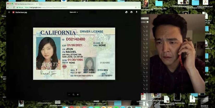 John Cho on the phone on a computer screen in Searching