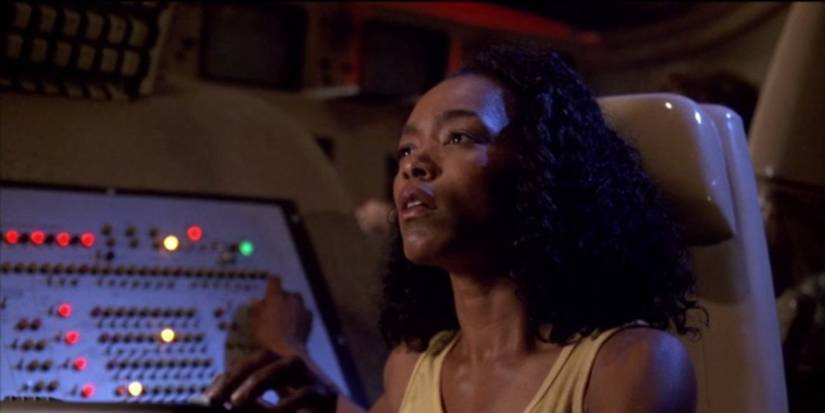 Fran (Angela Bassett) looking intently ahead in Critters 4
