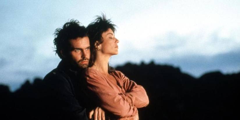 A man, Jason Patric, and a woman embrace as daylight fades in After Dark My Sweet.