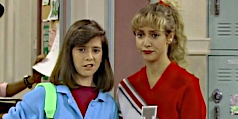 Jessie (Alyson Hannigan) stands next to her housekeeper at school in Free Spirit.
