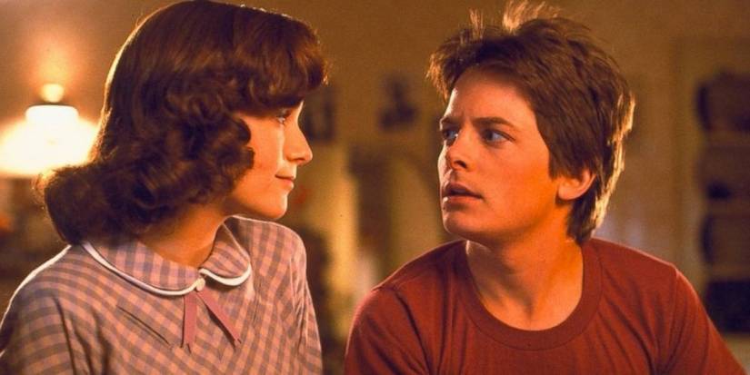 Lorraine Baines (Lea Thompson) looks at a confused Marty McFly (Michael J. Fox) in 'Back to the Future'.