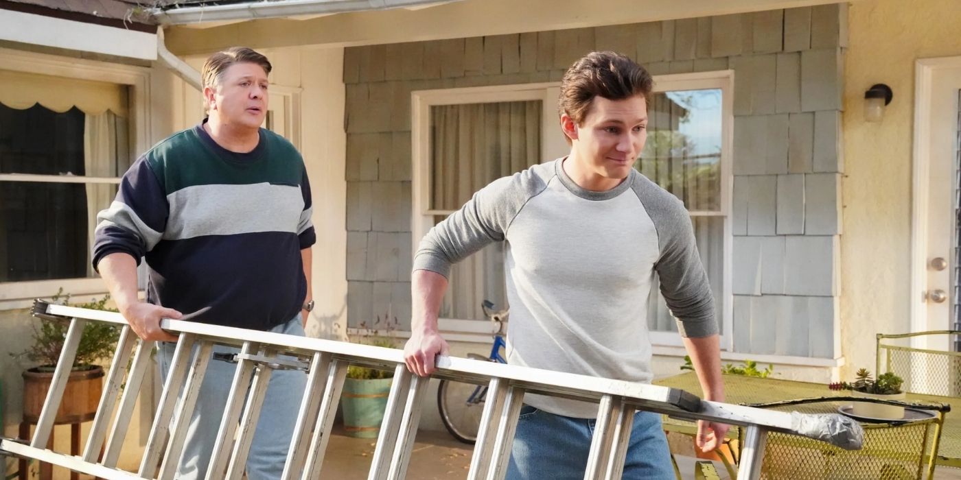 Lance Barber and Montana Jordan carry a ladder in Young Sheldon