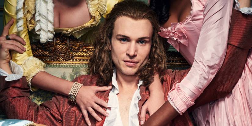 Nicholas Denton as Valmont surrounded by women in Dangerous Liaisons