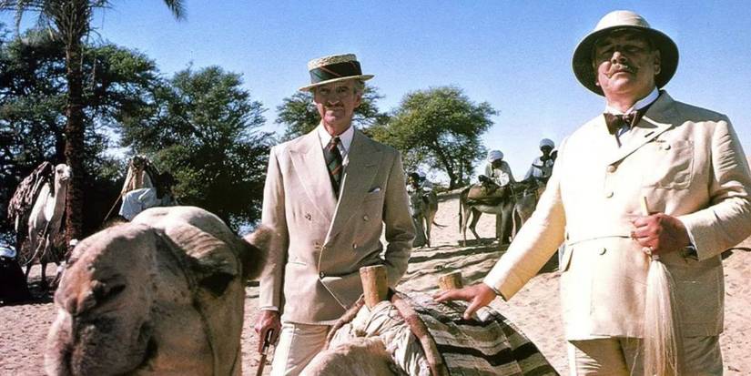 Two men in the desert in Death on the Nile