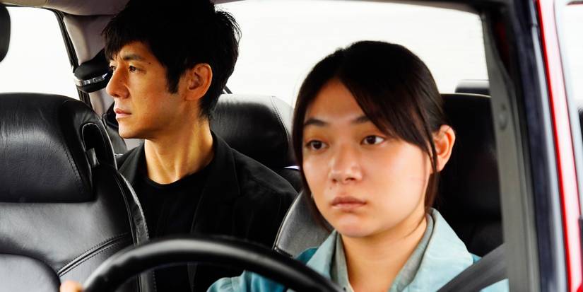 Hidetoshi Nishijima as Yūsuke Kafuku and Tōko Miura as Misaki Watari riding in the car together in Drive My Car