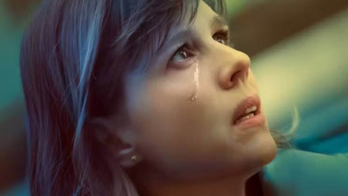 Katja Herbers as Kristen Bouchard with a single tear streaming down her face from the Season 1 poster for 'Evil.'