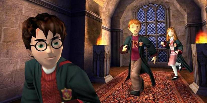 Golden Trio running through halls in 'Chamber of Secrets' video game