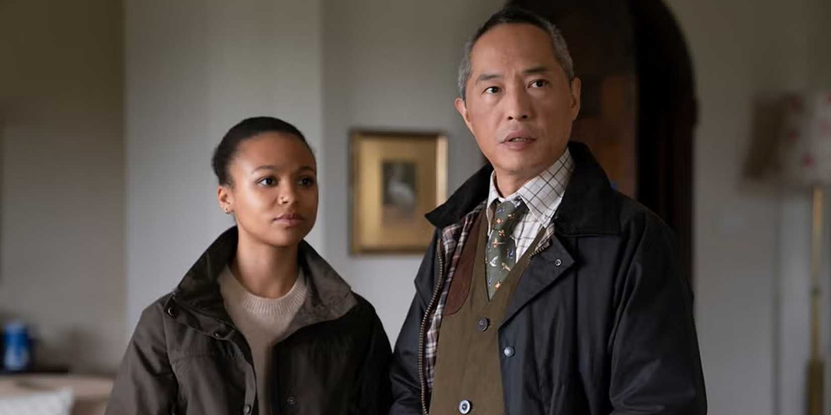 Harper (Myha’la) and Eric (Ken Leung) standing next to each other in Industry Season 2.