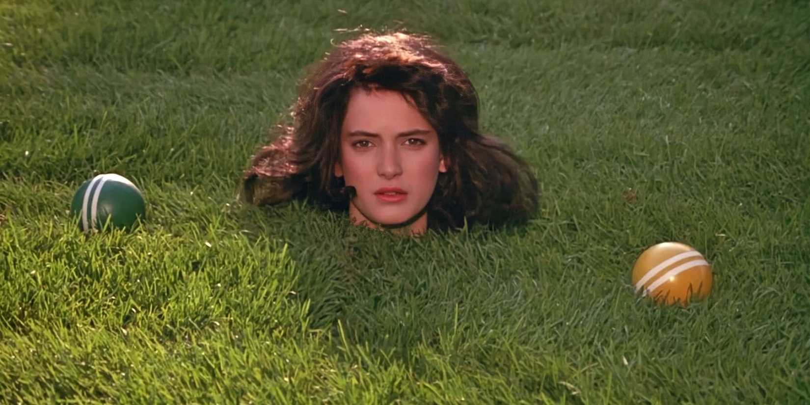 Veronica buried in the ground with only her head coming out of Heathers