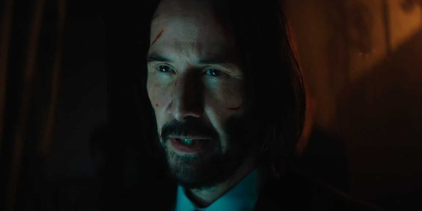Keanu Reeves as John Wick with cuts on his face in Ballerina.