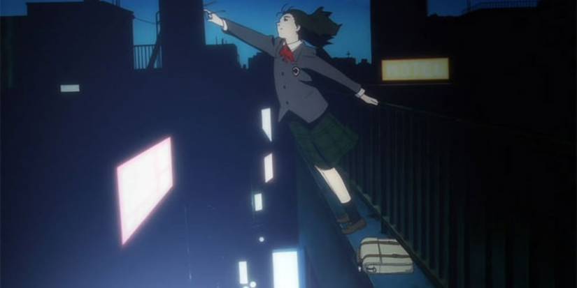 Mika reaching for something on the edge of a building in Serial Experiments Lain