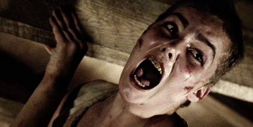 Janet Montgomery hanging from the ceiling as Mary in Salem.