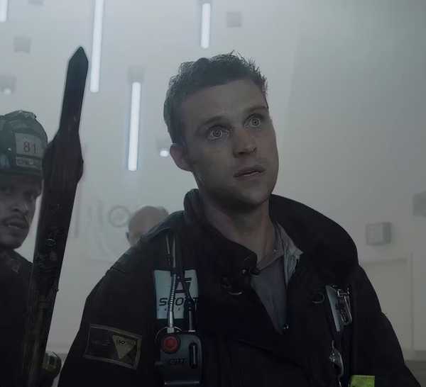 Jesse Spencer (Matt Casey) & Joe Minoso (Joe Cruz) in firefighter gear responding to a call in Chicago Fire.
