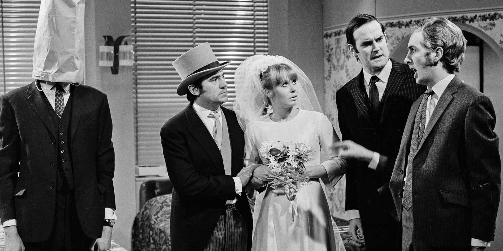 Terry Jones and Carol Cleveland get married near John Cleese, and Eric Idle in 'Monty Python's Flying Circus'