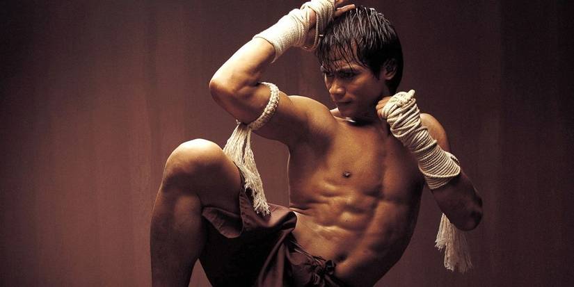Tony Jaa as Ting about to throw a kick in Ong-Bak: Muay Thai Warrior
