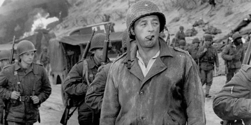 A soldier on the battlefield looking to the distance in The Longest Day