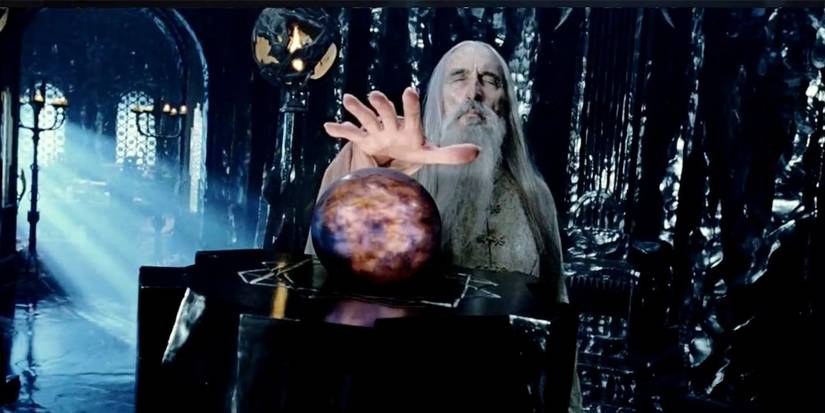 Saruman (Christopher Lee) reaching for the palantir in The Two Towers.