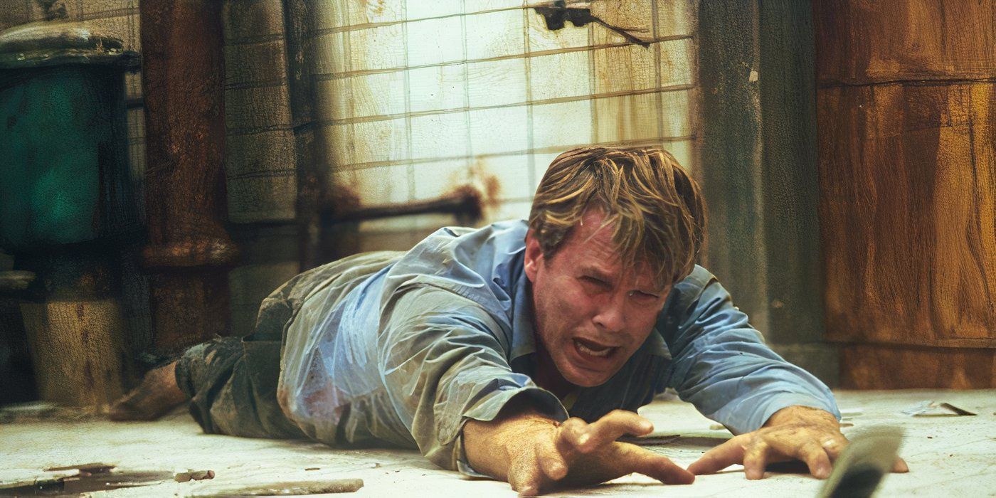 Lawrence crying while crawling on the floor in Saw