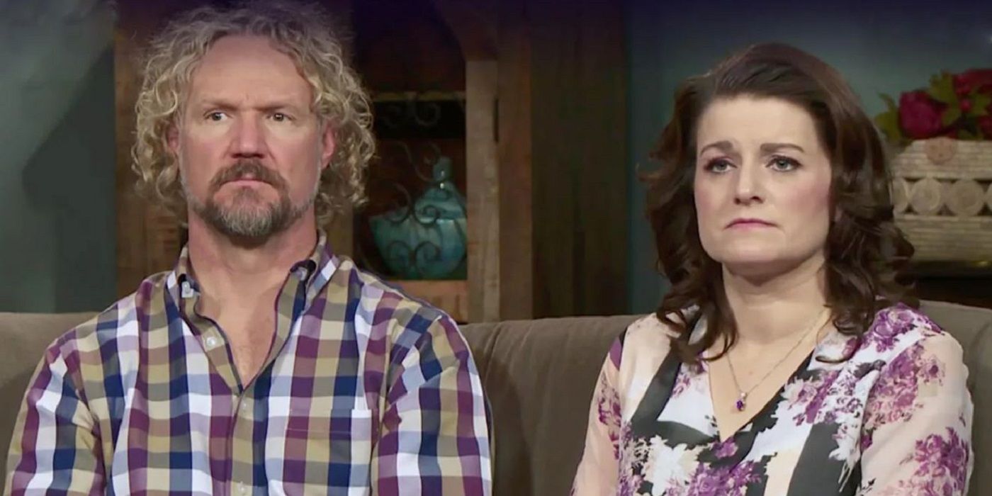 Robyn and Kody Brown sit seriously on the couch on &lsquo;sister wives.'